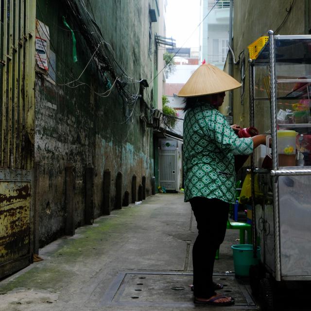 Outdoor food vendor in Vietnam